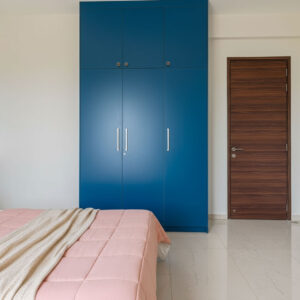 MODERN 3 DOOR BLUE SWING WARDROBE DESIGN WITH MIRRORED PANEL AND SLEEK BLACK HANDLES